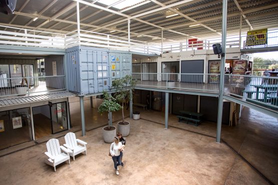 shipping container conversions - shopping complex constructed out of used shipping containers