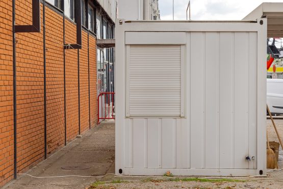 converted shipping container - One Window With Blinds at Converted Cargo Container