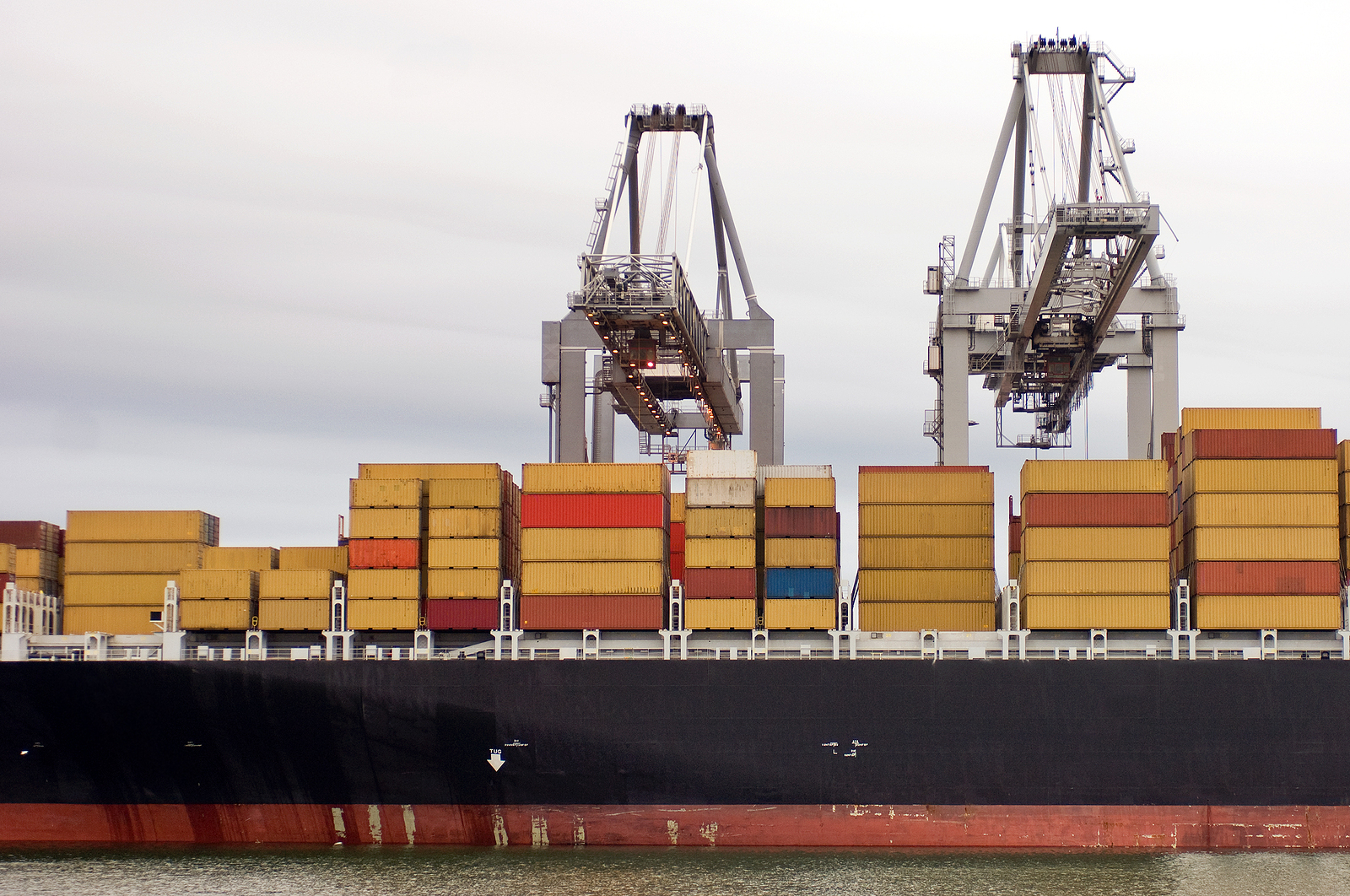 Converted shipping containers - Container ship being unloaded